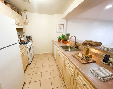 67-27 Exeter Street - Photo Thumbnail 2