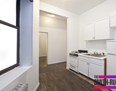 412 W 49th St - Photo Thumbnail 1