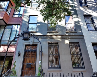 East 74th St - Photo Thumbnail 13