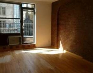 117 West 58 St - Photo Thumbnail 1