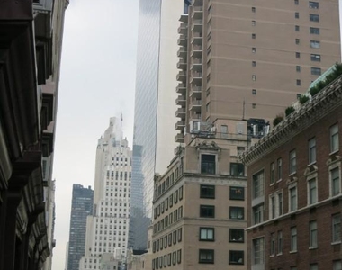 W 58th St. - Photo Thumbnail 3