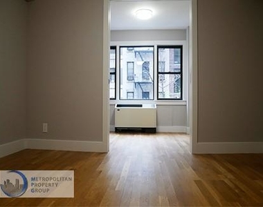 320 E 52nd St. - Photo Thumbnail 2