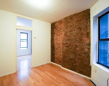 338 East 5th Street - Photo Thumbnail 3