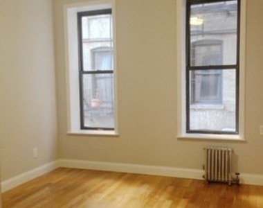 209 West 21st Street - Photo Thumbnail 0