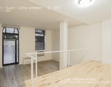 201 East 12th Street - Photo Thumbnail 2