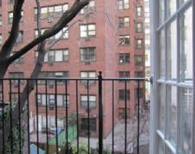 East 16th Street - Photo Thumbnail 1