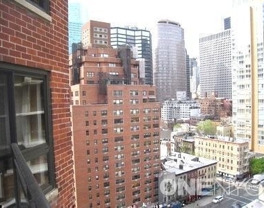 E 51st St. - Photo Thumbnail 2