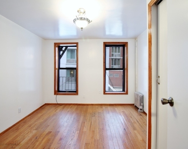 332 West 37th Street - Photo Thumbnail 0