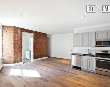 106 Ridge  Street - Photo Thumbnail 2