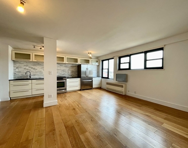 115 East 122nd Street - Photo Thumbnail 0