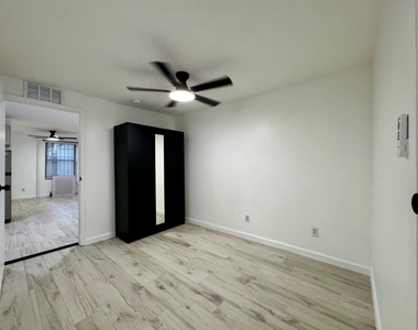 231 East 115th Street - Photo Thumbnail 4