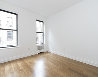 351 E 58th St - Photo Thumbnail 1