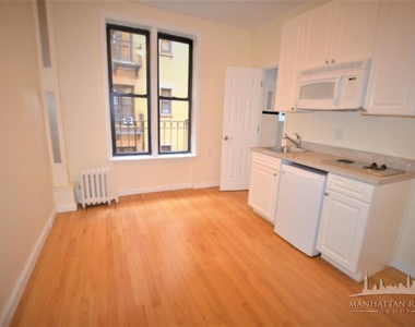 305 W 45th St - Photo Thumbnail 0