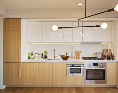 605 West 42nd Street - Photo Thumbnail 2