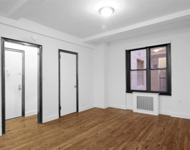 206 West 23rd St - Photo Thumbnail 2