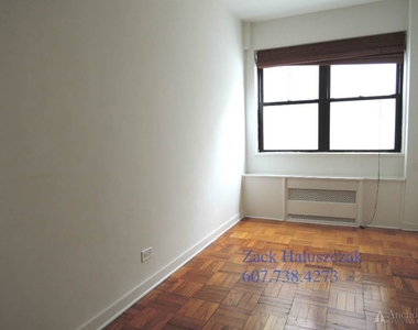 E 55th St. - Photo Thumbnail 4