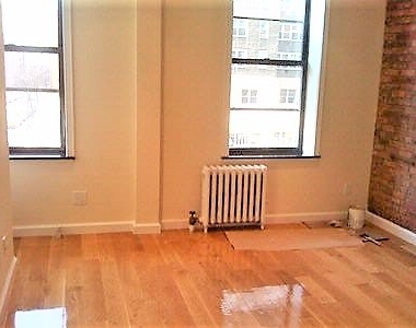 444 West 52nd Street - Photo Thumbnail 1