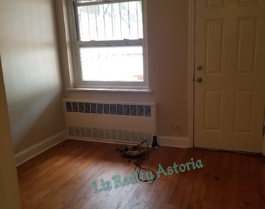 2 bedroom apt ( junior 4) with back yard and parking additional in Woodside - Photo Thumbnail 9