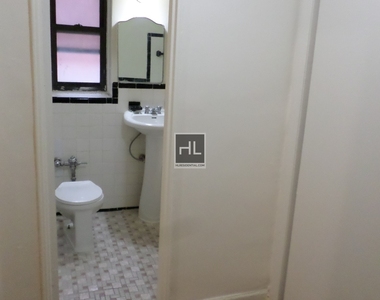 72-10 37 Avenue - Photo Thumbnail 6