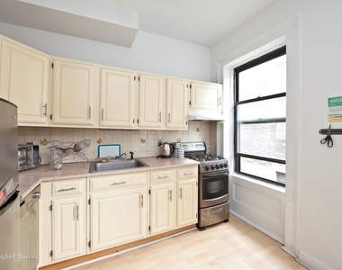 467 West 49th St - Photo Thumbnail 0