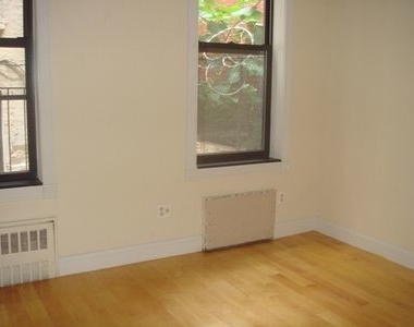 209 E 25th - Photo Thumbnail 1