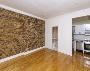 338 E 55th St - Photo Thumbnail 1