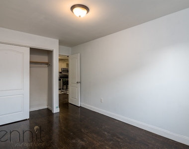 1107 Irving Ave - Photo Thumbnail 4