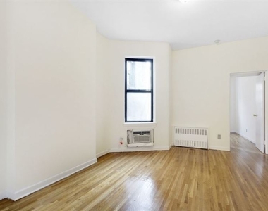 437 West 48th  - Photo Thumbnail 1