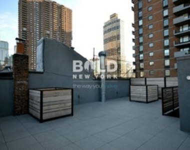 459 W 43rd St - Photo Thumbnail 7