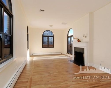 210 E 68th St - Photo Thumbnail 7