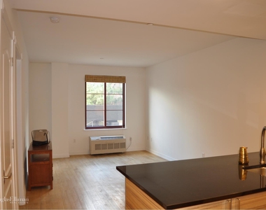 23-11 21st Avenue - Photo Thumbnail 1