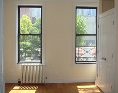 697 Tenth Ave - Photo Thumbnail 2