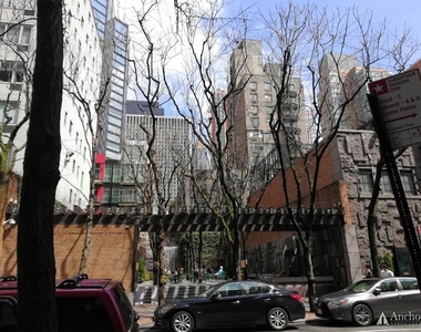 E 51st St. - Photo Thumbnail 5