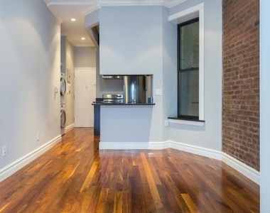 209 E 25th - Photo Thumbnail 1