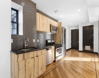 276 E 23rd Street  - Photo Thumbnail 1