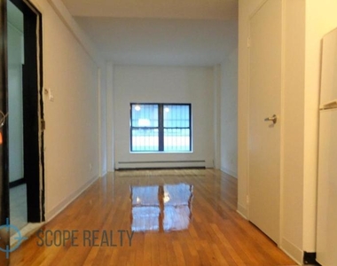 523 West 49th Street - Photo Thumbnail 0