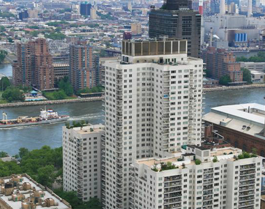 East 77th Street with dining area - Photo Thumbnail 1