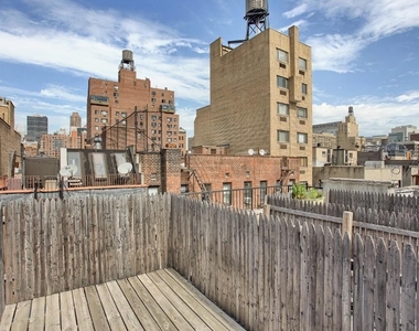 219 E 28th Street  - Photo Thumbnail 0