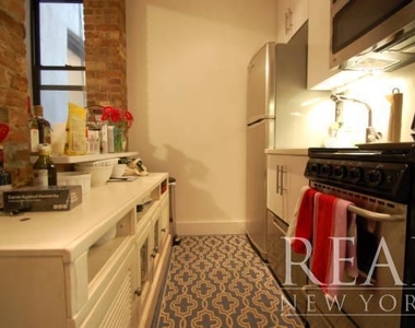 303 Broome St - Photo Thumbnail 1