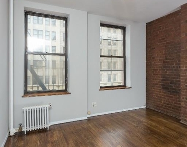 221 E 23rd St - Photo Thumbnail 1