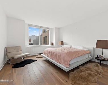 401 East 60th St - Photo Thumbnail 1