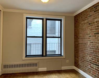 209 E 25th Street - Photo Thumbnail 1