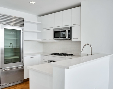 635 West 42nd St - Photo Thumbnail 1