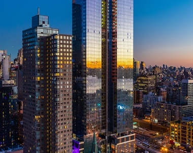 555 Tenth Ave - Photo Thumbnail 2