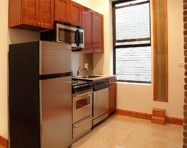 324 East 52nd Street - Photo Thumbnail 0