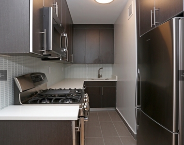 410 west 53rd st, - Photo Thumbnail 1