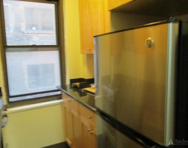 E 56th St. - Photo Thumbnail 7