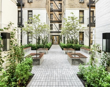 220 West 24 Street - Photo Thumbnail 1