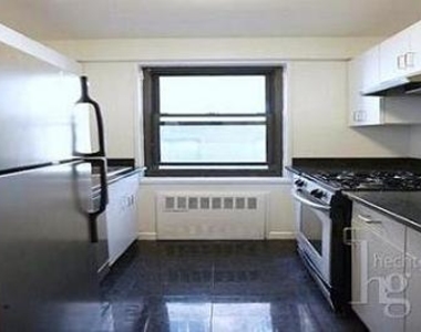 E 56th St. - Photo Thumbnail 3