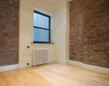 325 East 5th Street - Photo Thumbnail 2